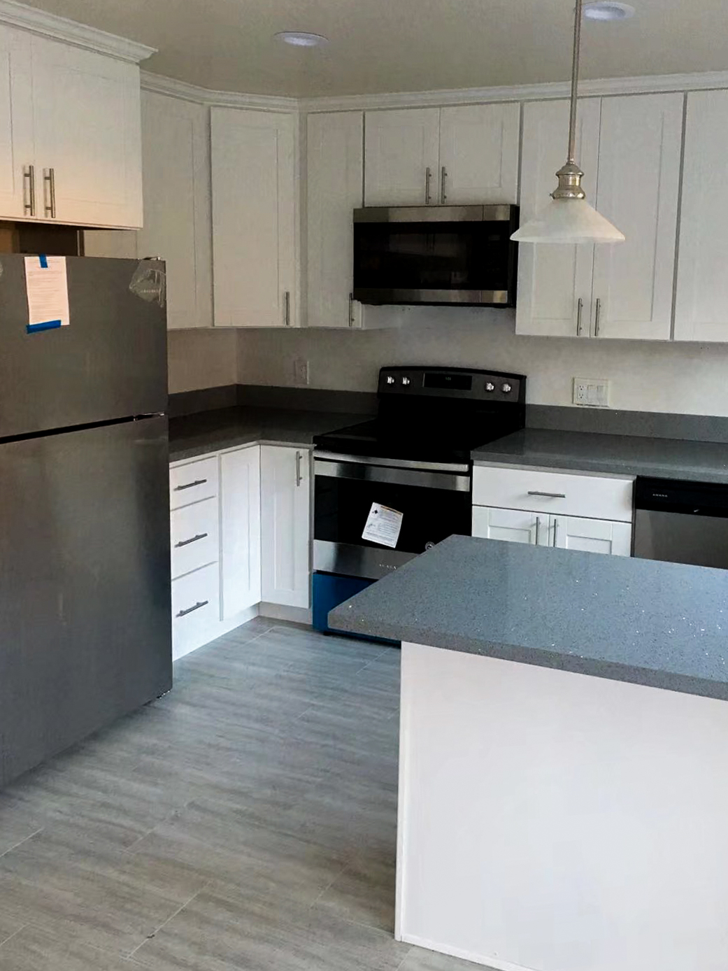 a gray and white kitchen