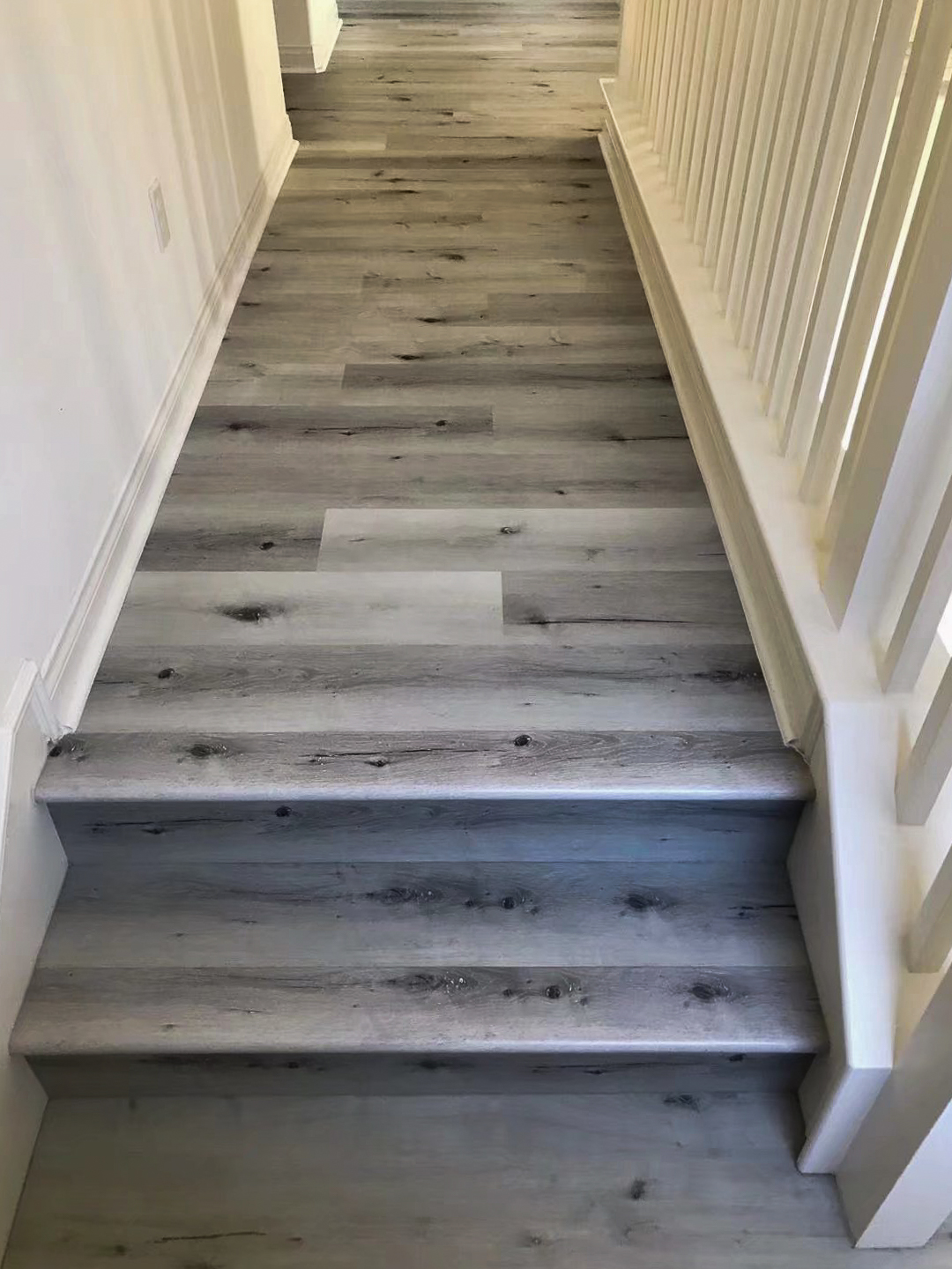 wood floor with stairs